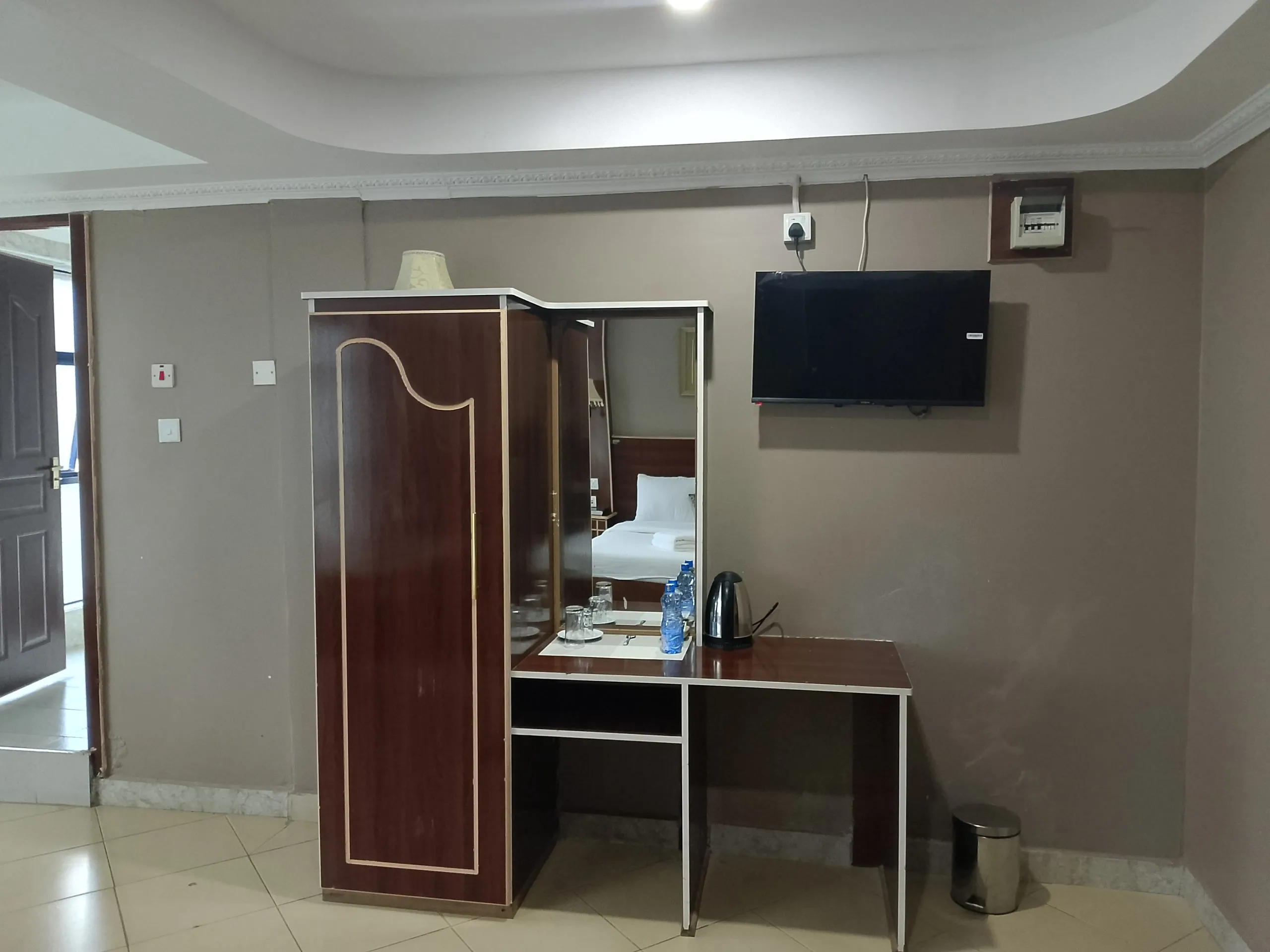 Vanity unit and mirror in a guest room at Generis Hotel